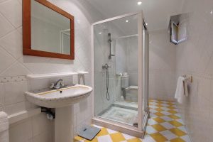 Basement yellow shower room