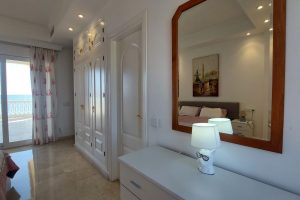 Pink bedroom and sea views