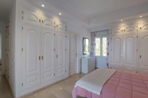 Pink bedroom and wardrobes